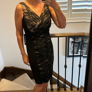 Stunning Black Jeweled Dress by Tahari. NWT. Never worn. Super Flattering